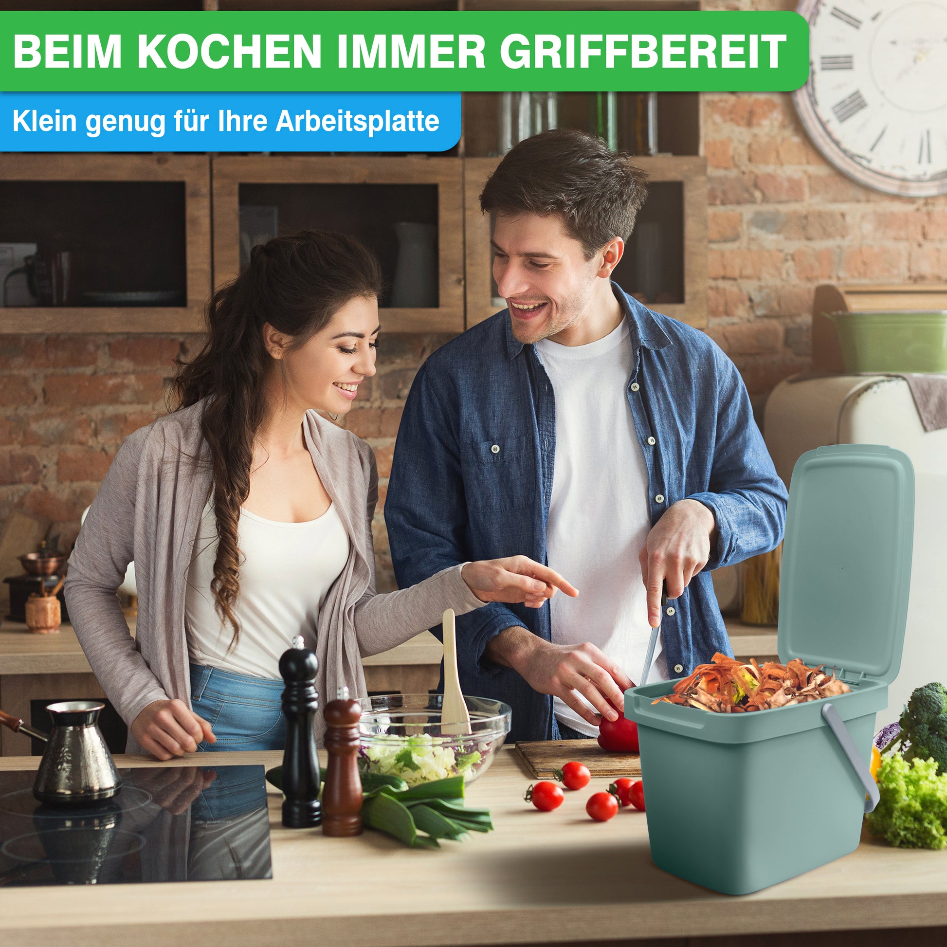Ein lächelndes Paar in einer Küche mit einem YourCasa® Biomülleimer Küche – 6L mit Deckel und Wandaufhängung, beim gemeinsamen Zubereiten von Essen.