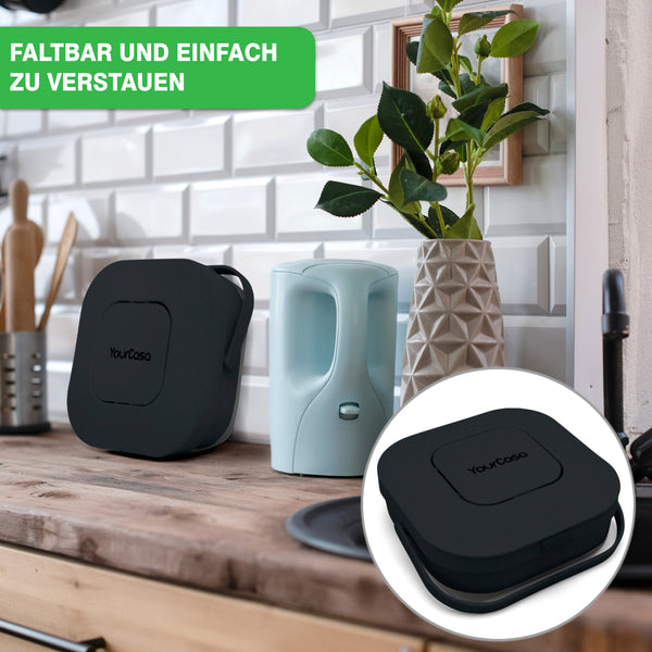 Kompakte und faltbare Küchengeräte sowie ein YourCasa® Komposteimer Küche – FALTBAR und NACHHALTIG – 4L Fassungsvermögen auf einer Arbeitsfläche neben Küchenutensilien.