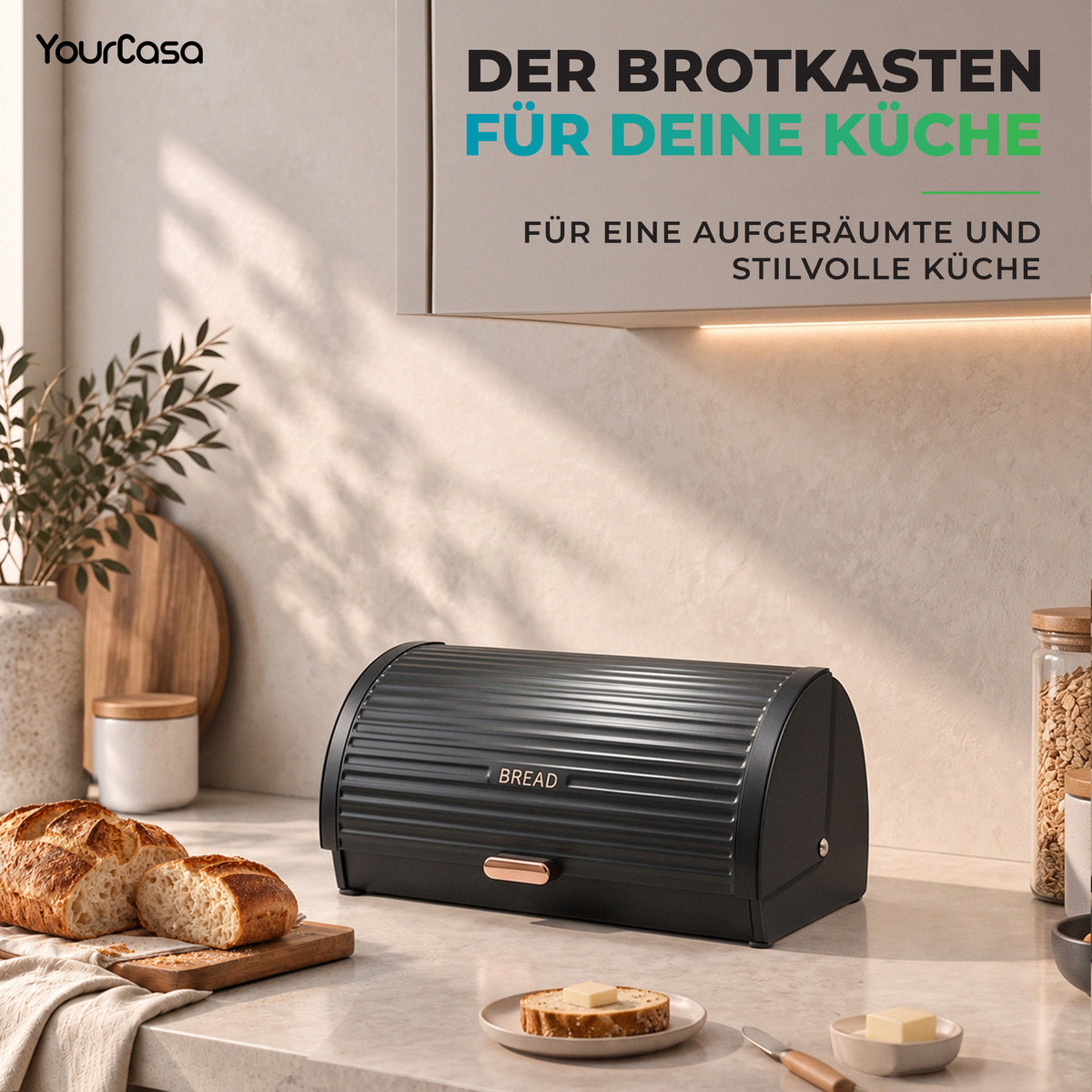 Schwarzer Brotkasten aus Metall mit BREAD-Schriftzug in moderner Küche